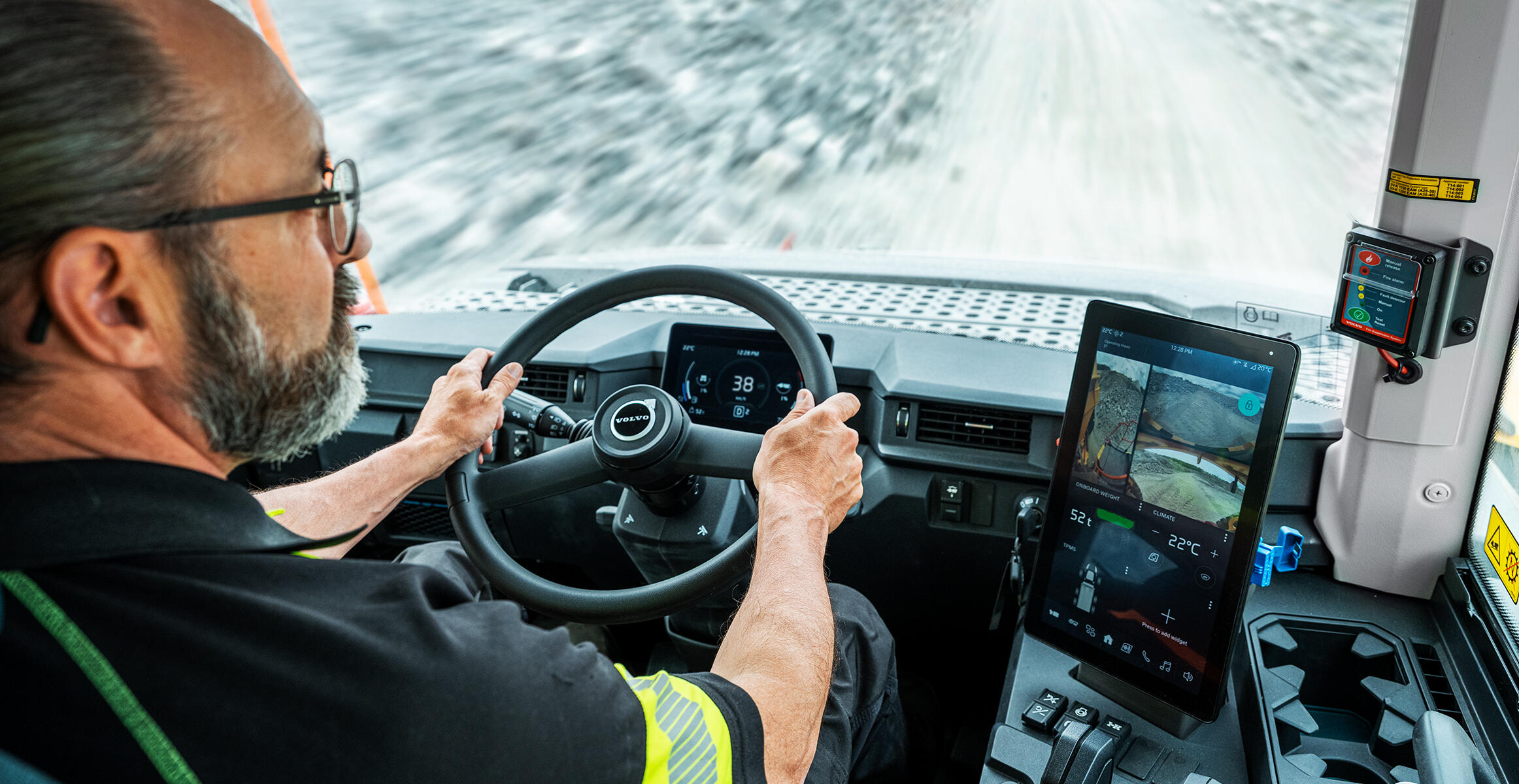 A person comfortably operating a Volvo articulated hauler