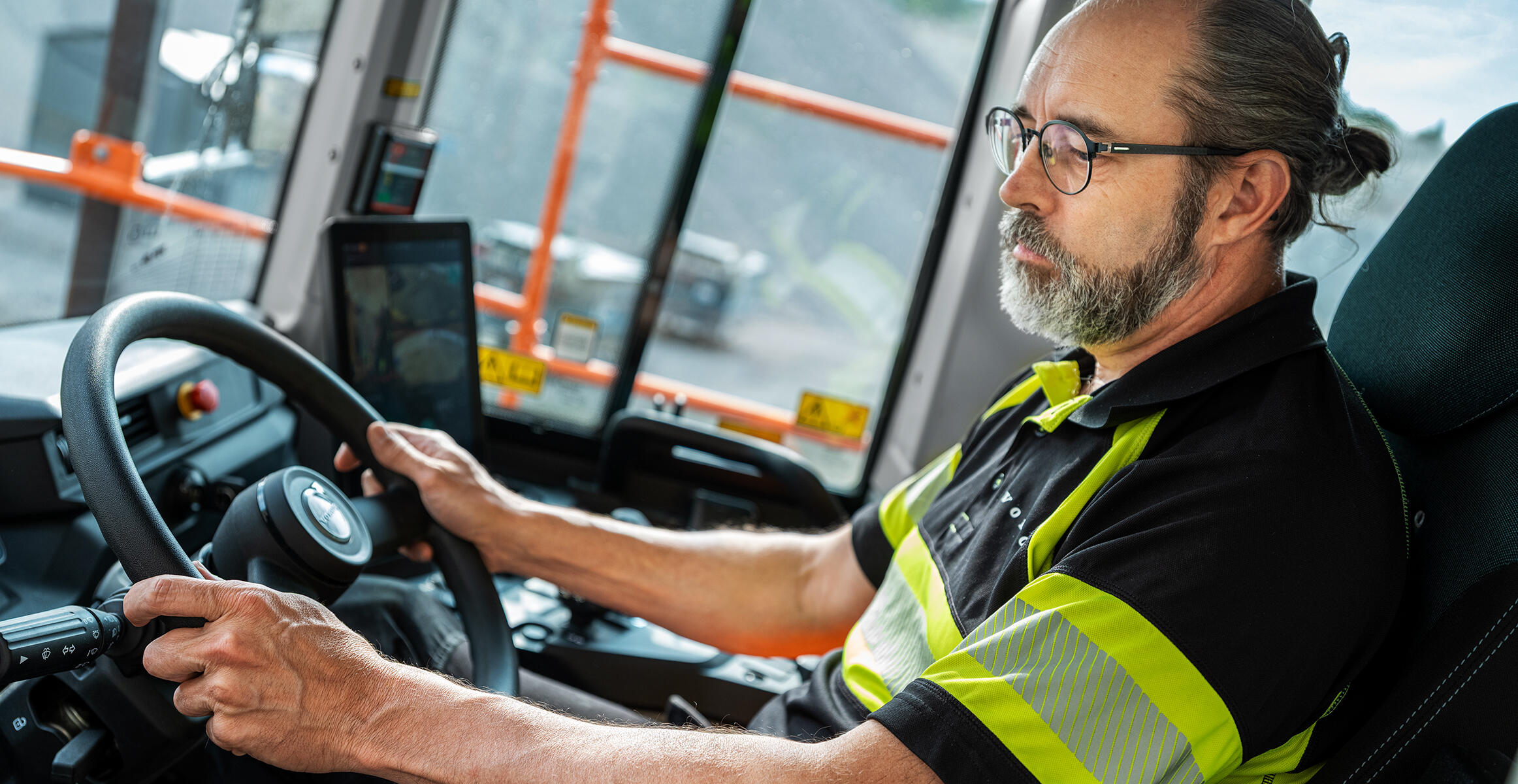 A person operating a new generation articulated hauler from Volvo