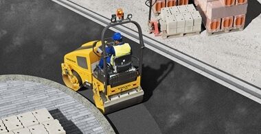 A Volvo DD25B asphalt compactor in a town street showing 360 degrees visibility