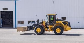On image the L90 electric is carrying with a fork a crate