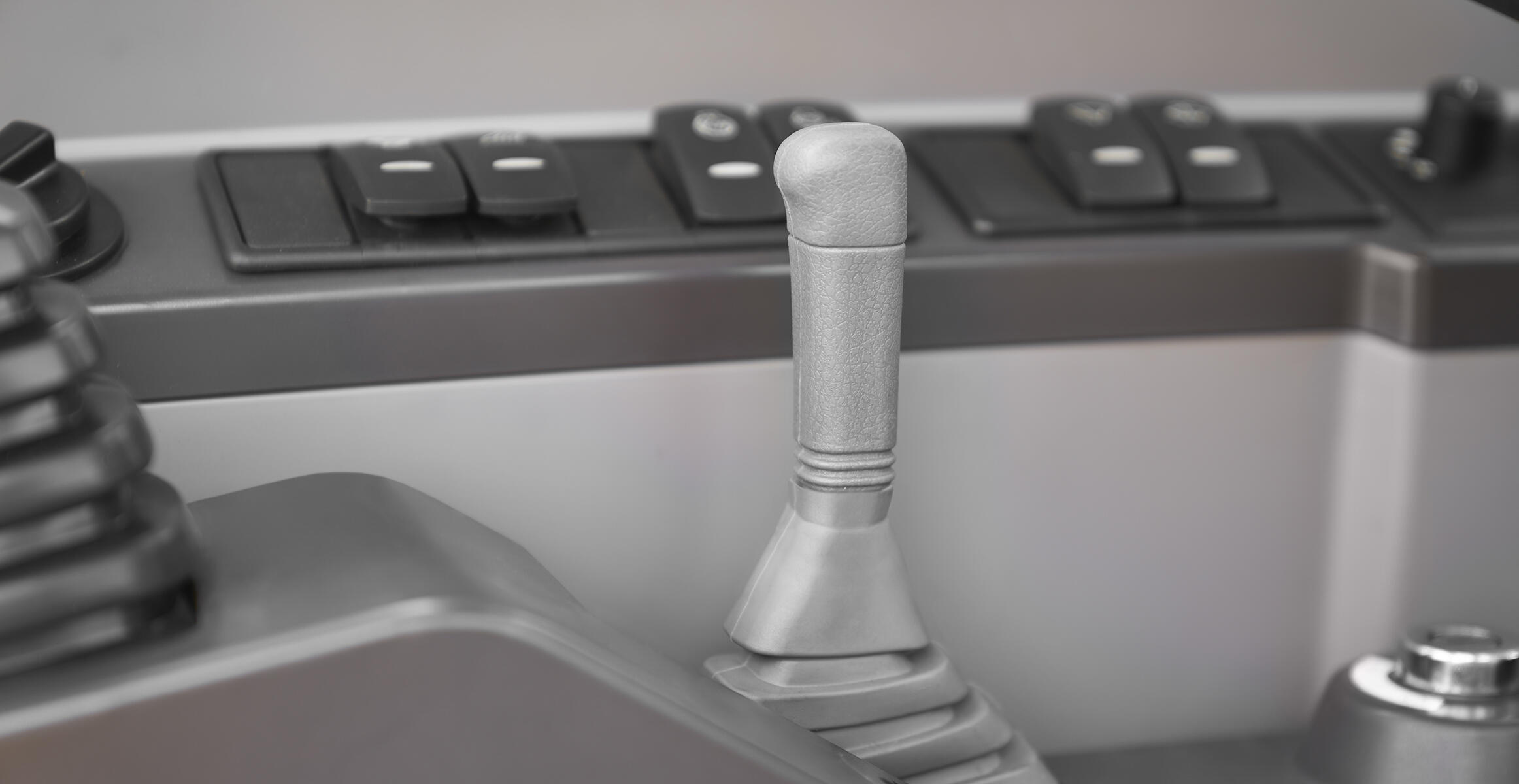 volvo-features-compact-excavator-ec75d-t3-dozer-blade-control-lever-volvo-cab-2324x1200