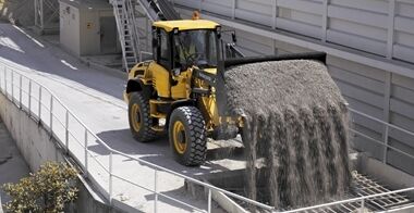 The Volvo L45H navigating through confined spaces, emphasizing its agility and precision.