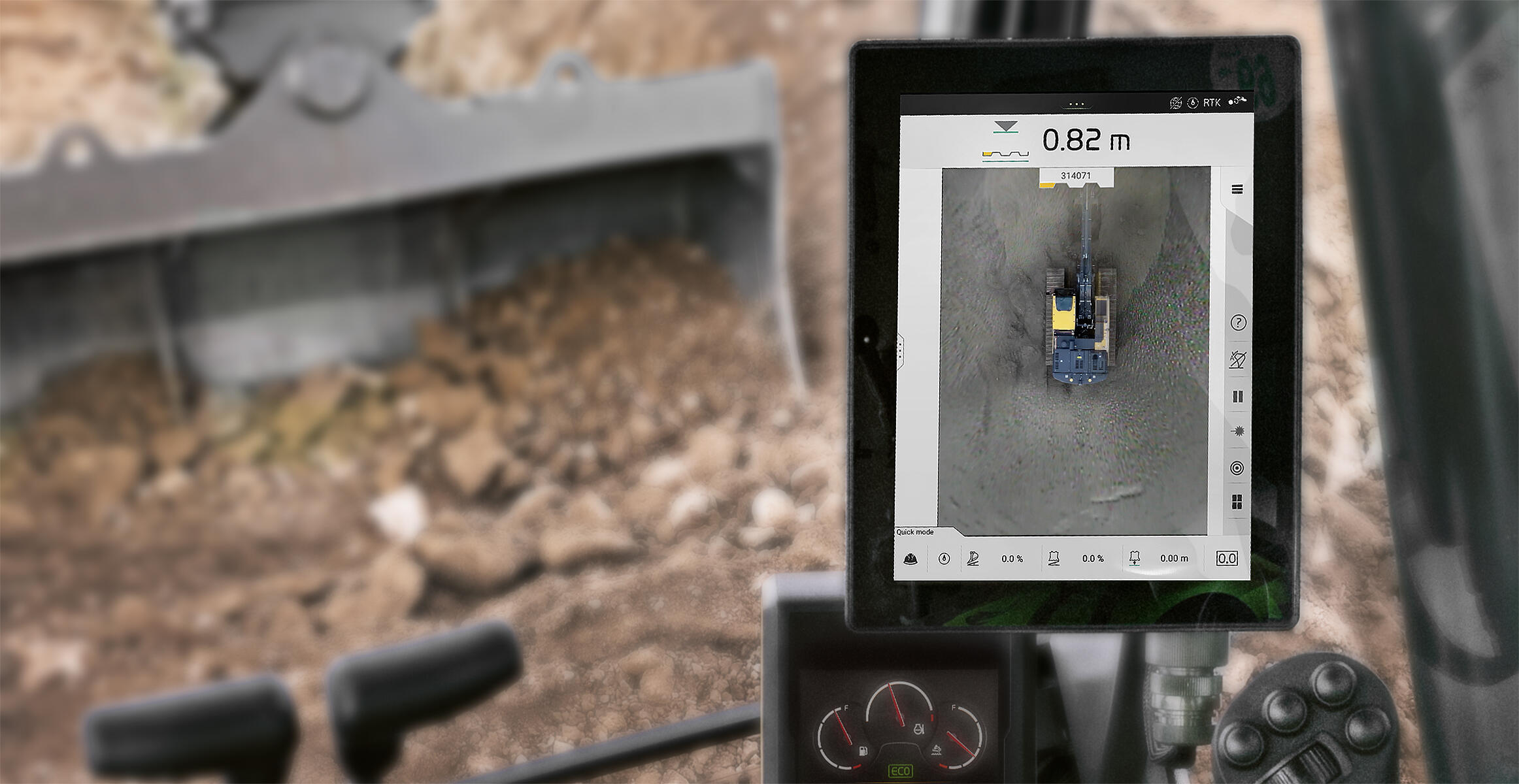 Volvo excavator control screen showing aerial view of construction equipment at worksite