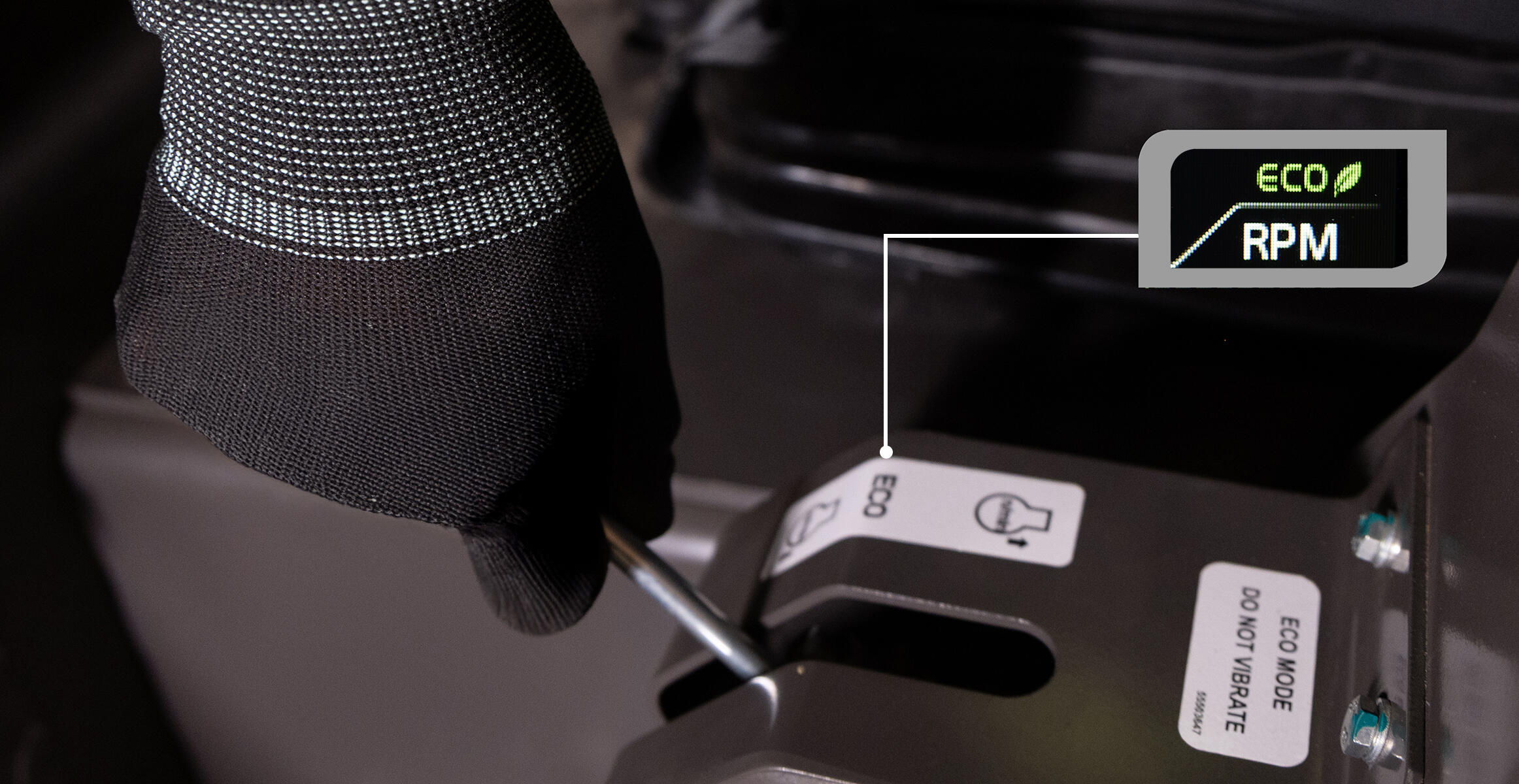 Close-up view of an operator switching to Eco mode using the selector lever on a Volvo SD120.