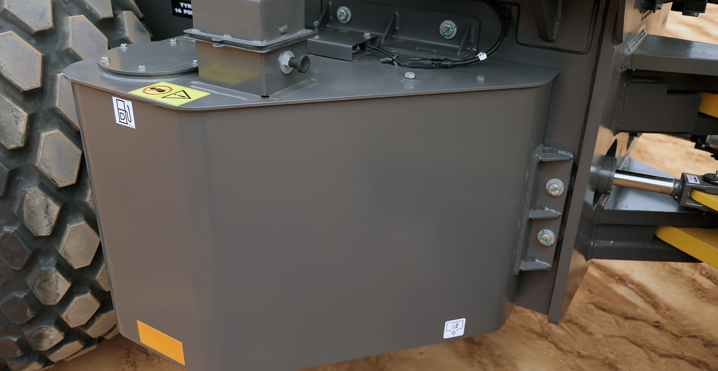 Close view of the hydraulic tank on a SD120 Volvo soil compactor.