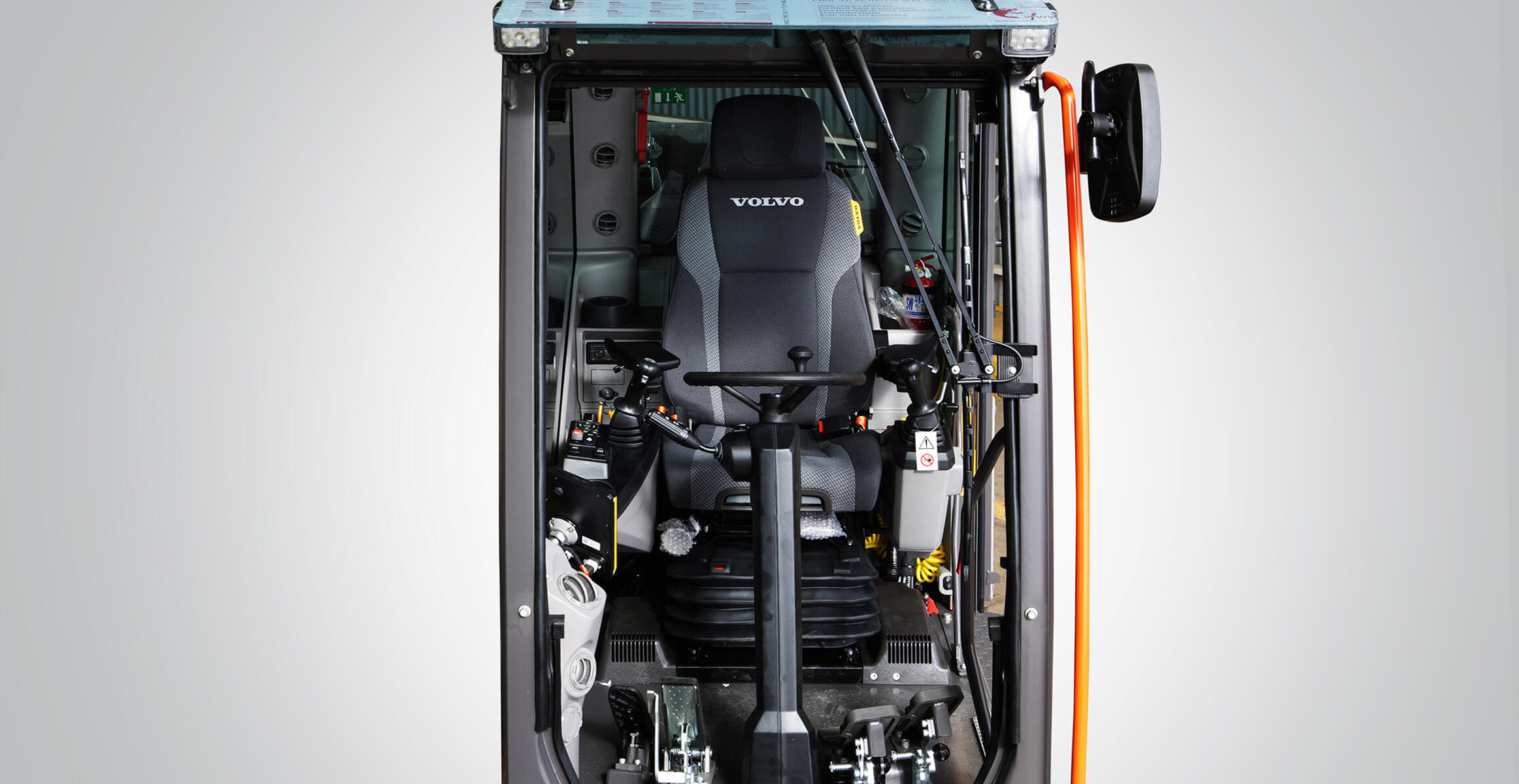 volvo-feature-wheeled-excavator-ew150e-kr-driving-space-cab-2324x1200