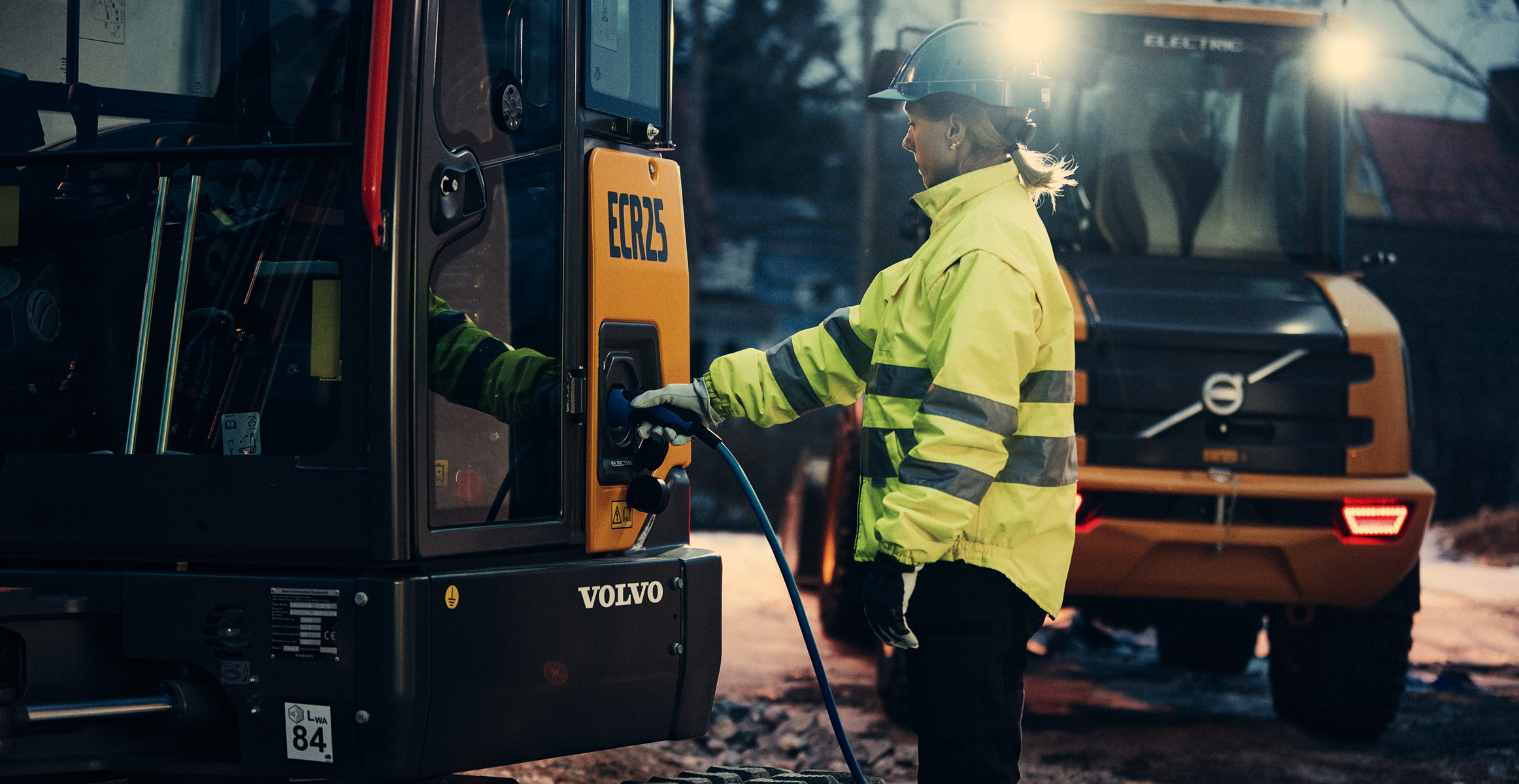 Woman charging electric machine