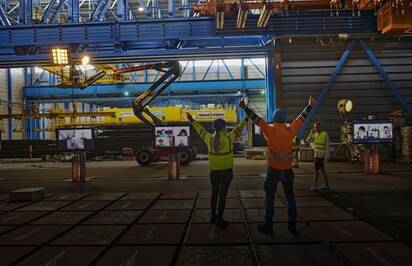 Team raising their hands in the air 