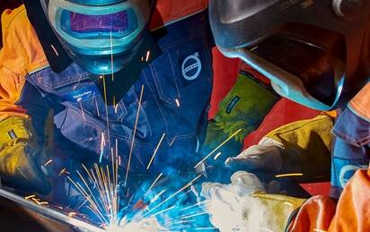 People welding