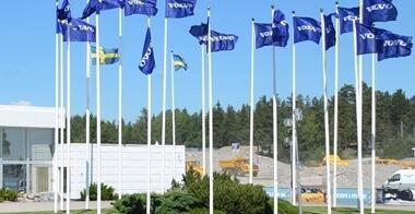 Multiple Volo flags outside Volvo CE customer center in Eskilstuna