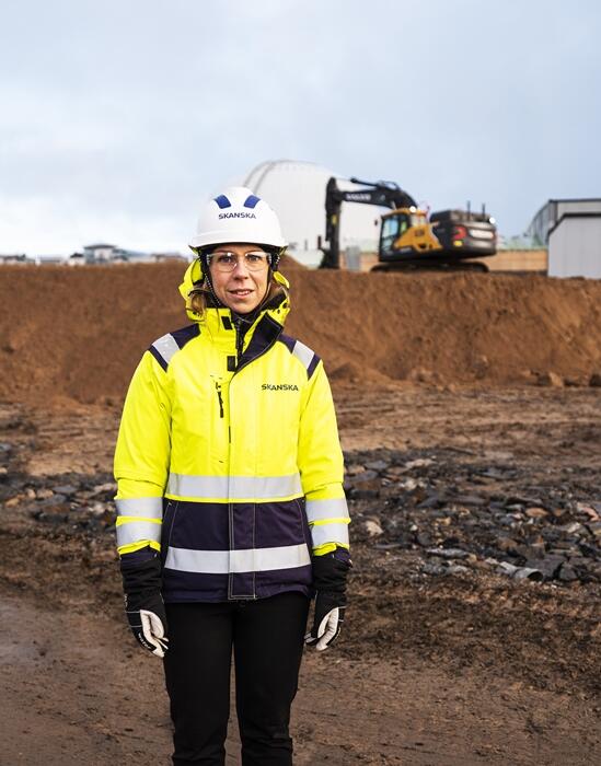 a woman operator at a worksite