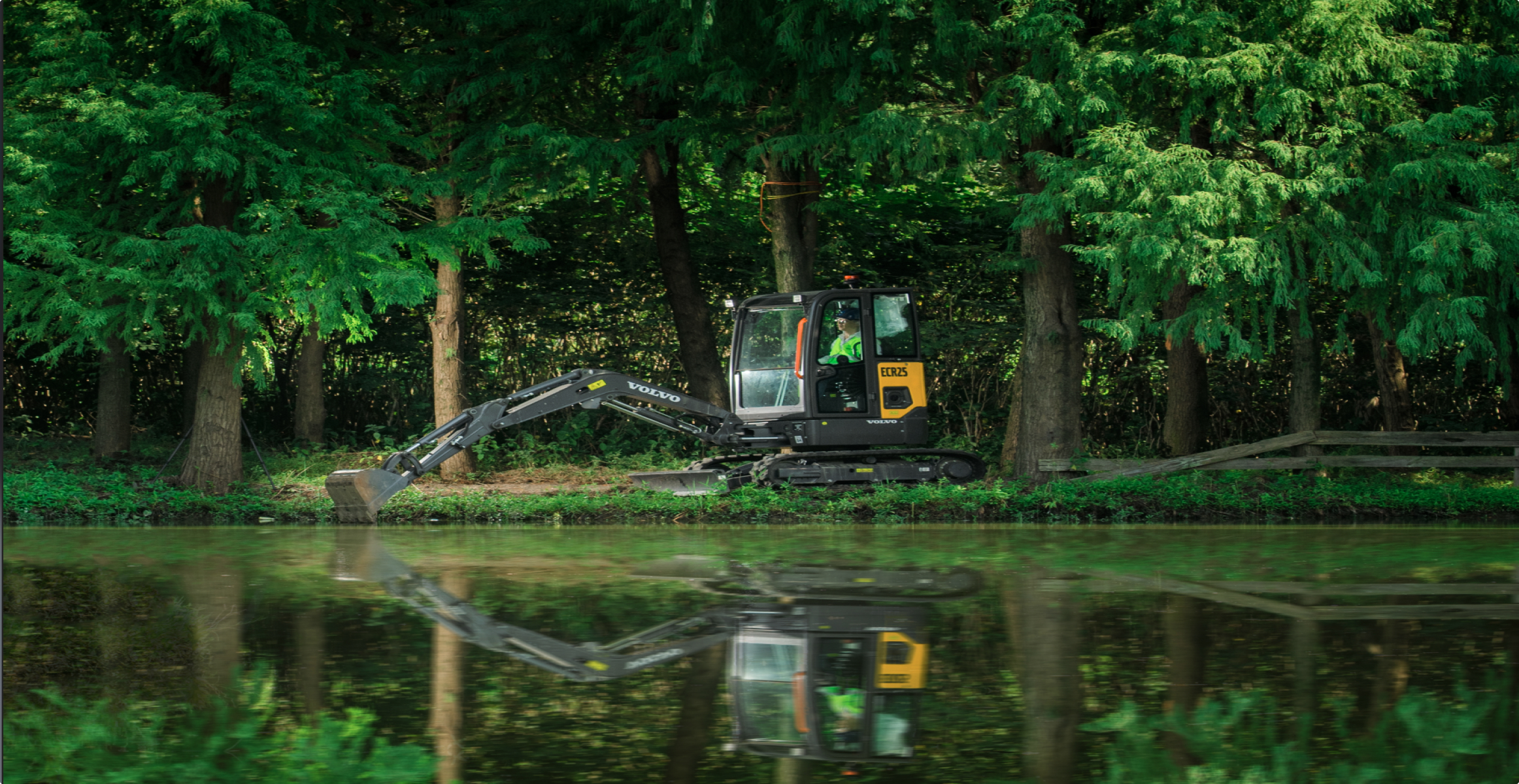 Electric excavator working close to a lake