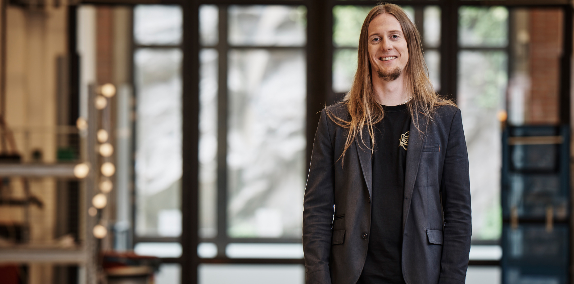 Volvo employee standing in a Volvo office 