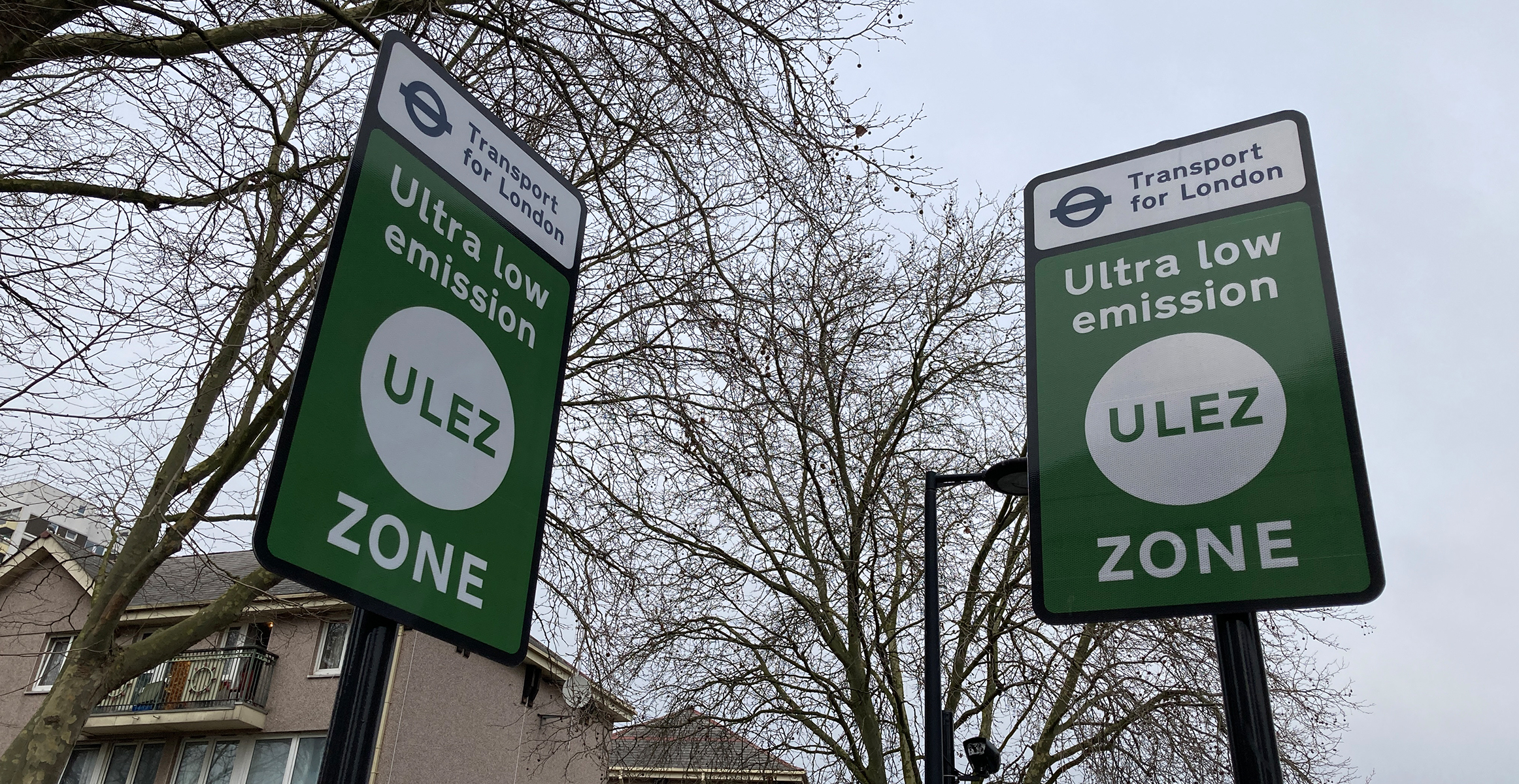 Signs indicating an ultra low emission zone (ULEZ) in London.