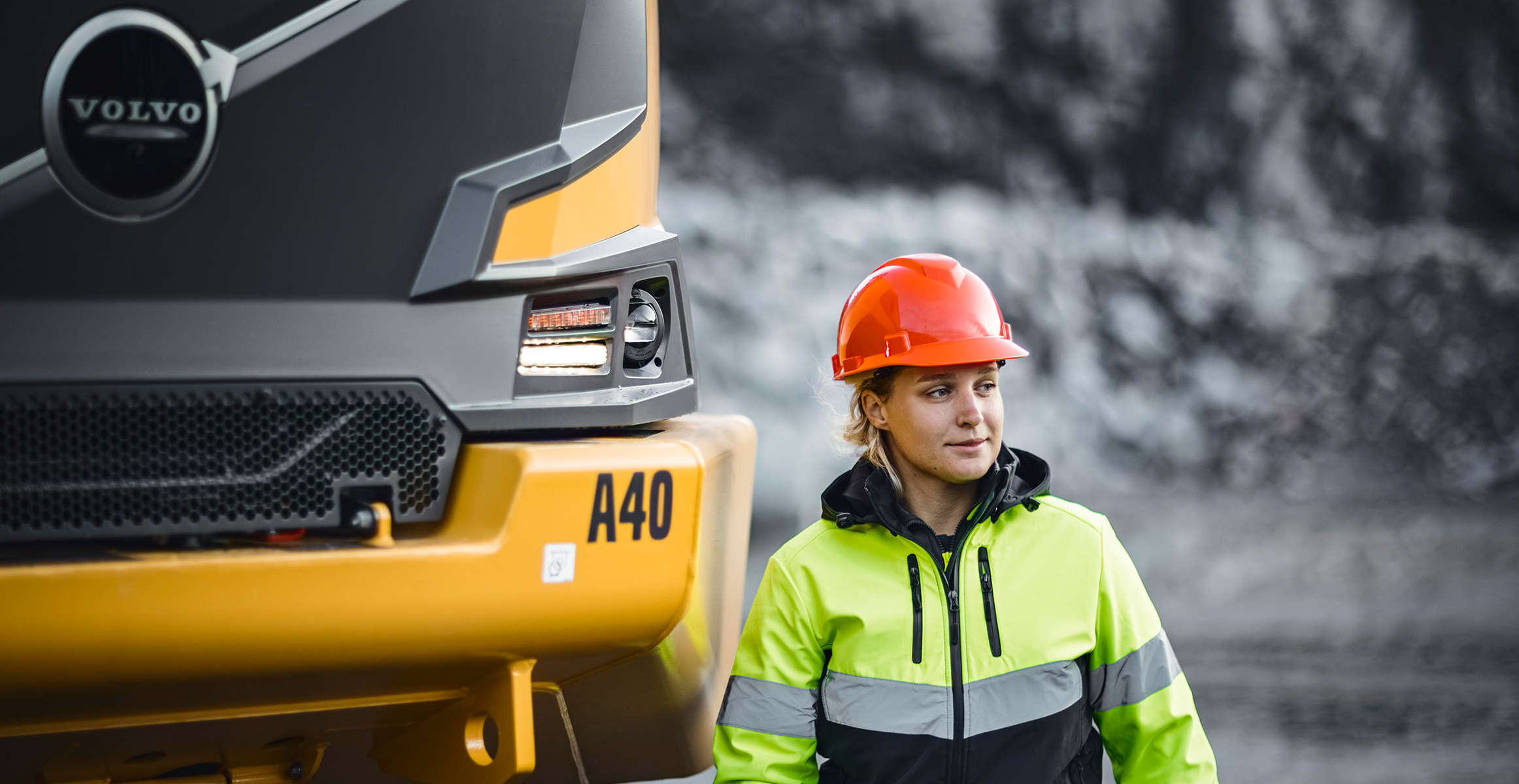 Female constructor thinking about increasing productivity.