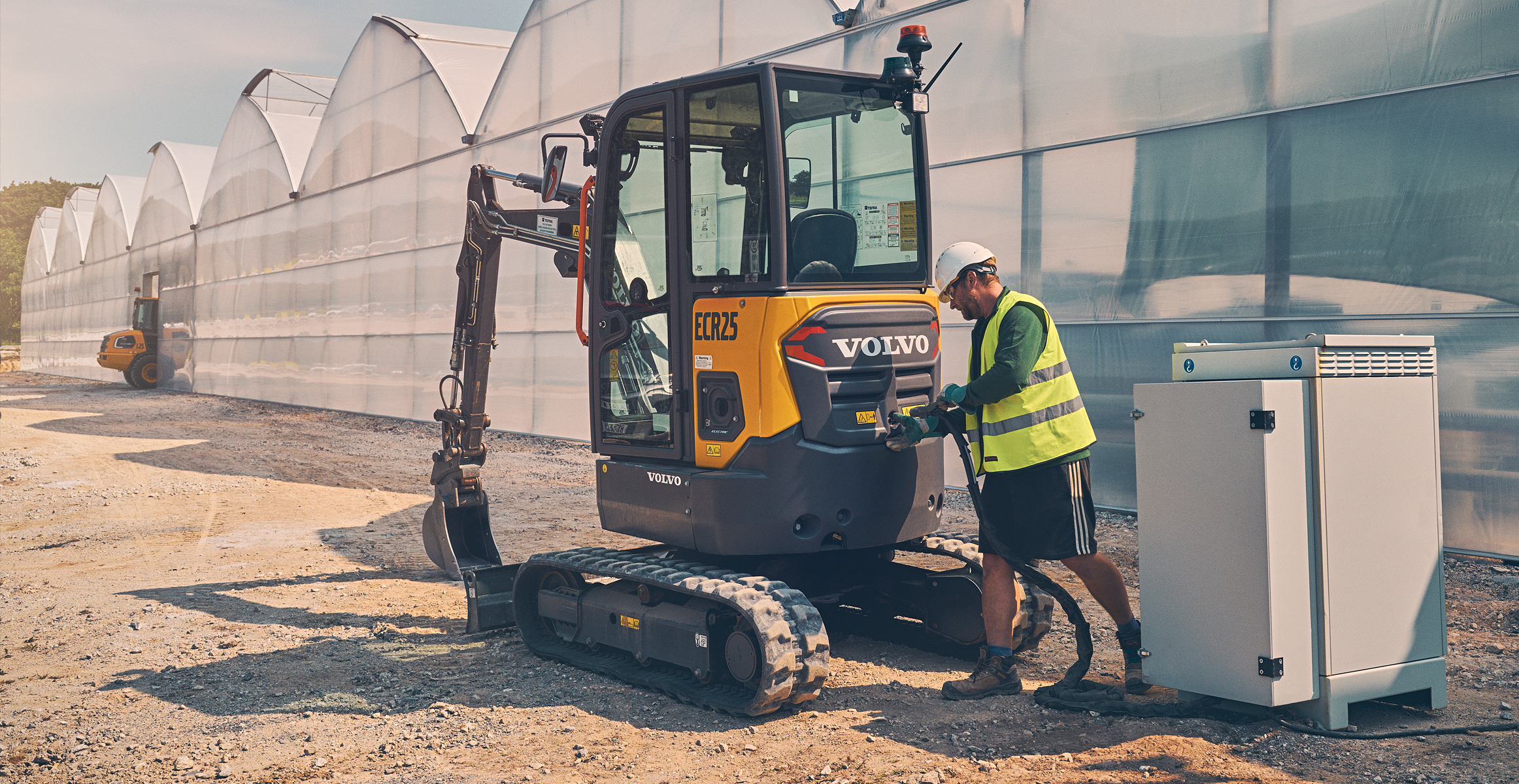 Electric excavator in landscaping