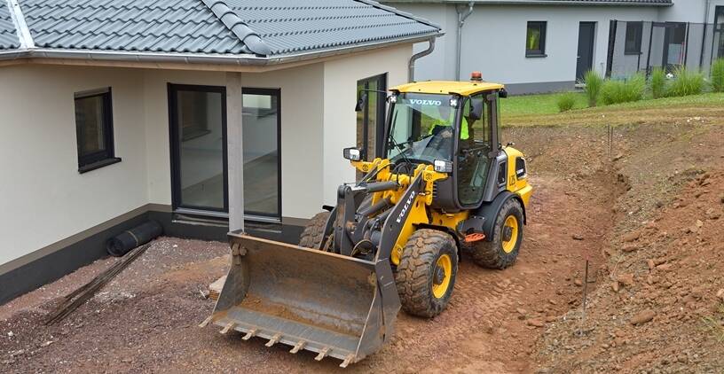 Electric wheel loader in gardening and landscaping