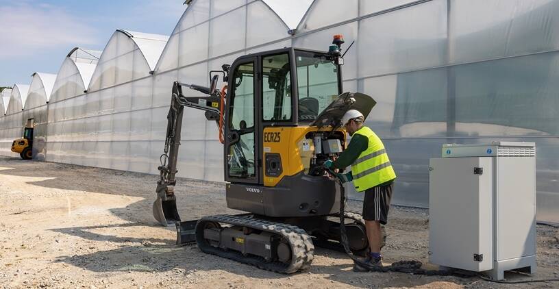 Charging electric compact excavator