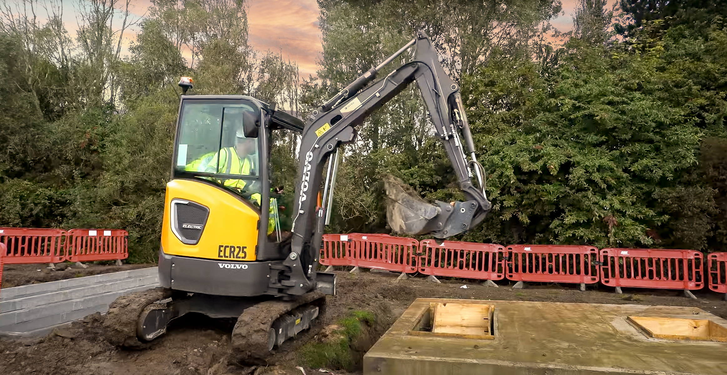 Volvo electric excavator digging for charging stations