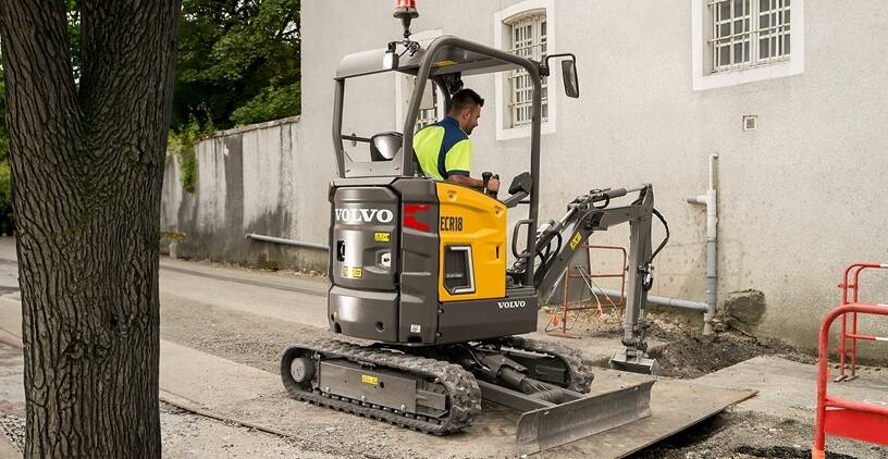 Electric utility works with electric excavator
