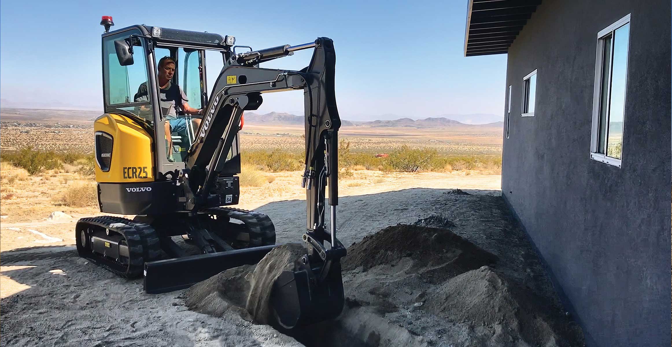 The ECR25 Electric performed various tasks in helping to build off-the-grid homes
