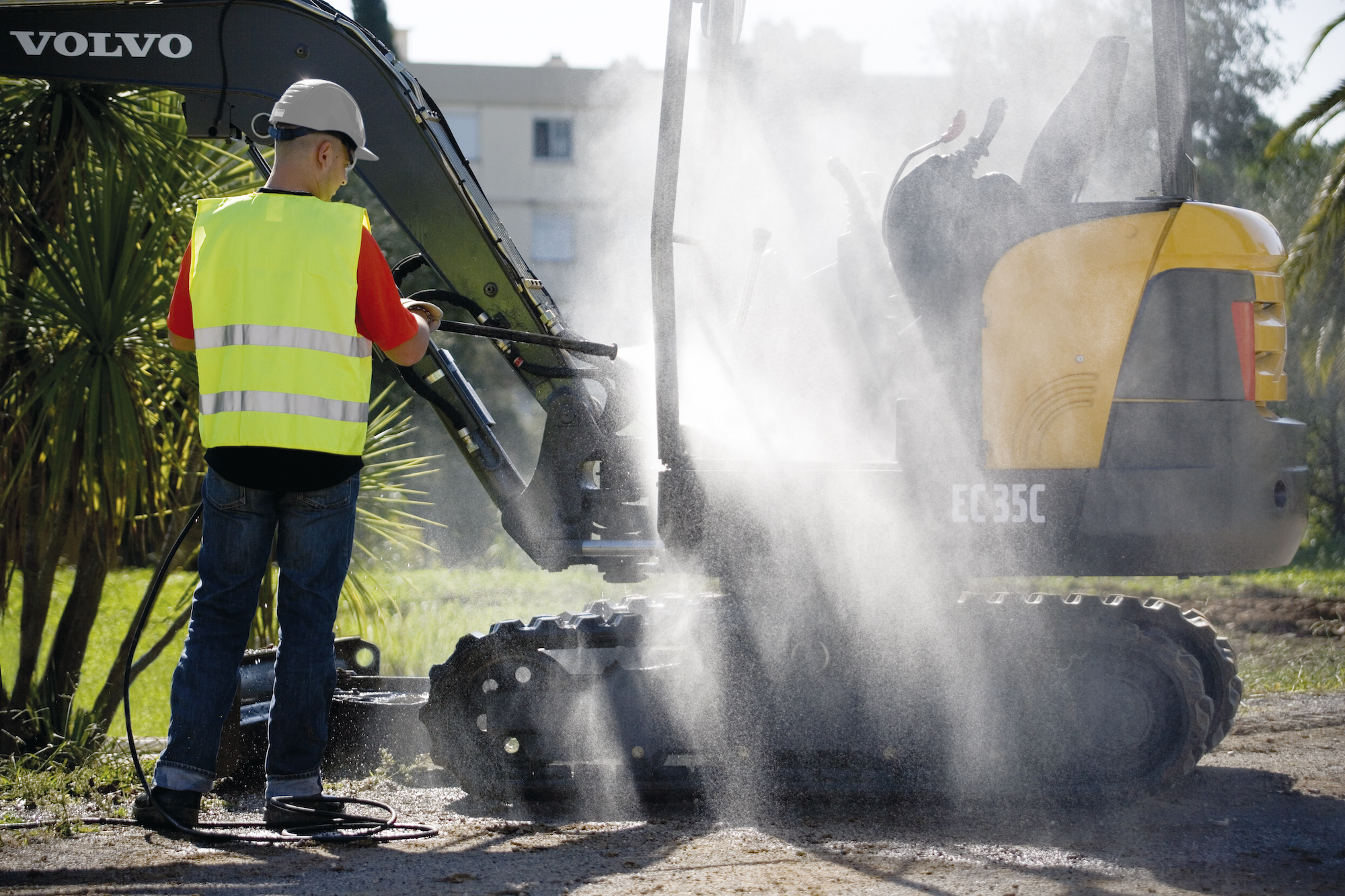 Power washing a Volvo EC35C mini excavator