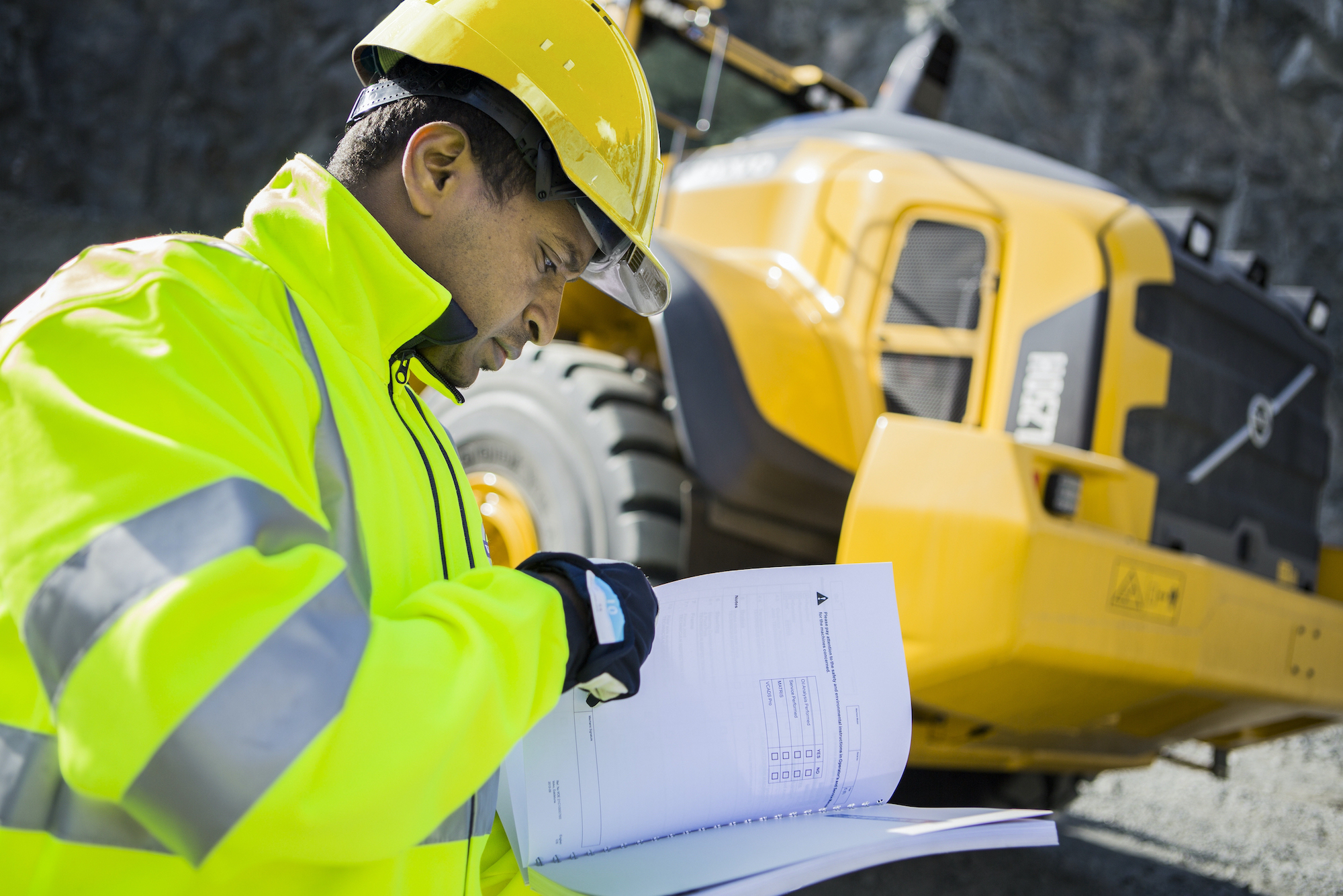 Heavy Equipment Technician Checking Basic Data