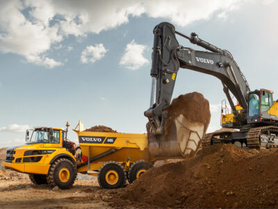 Volvo EC950F Excavator loading a Volvo Articulated Truck