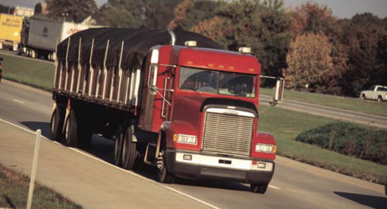 On highway truck traffic weight reduces air void reduction in asphalt pavement roads