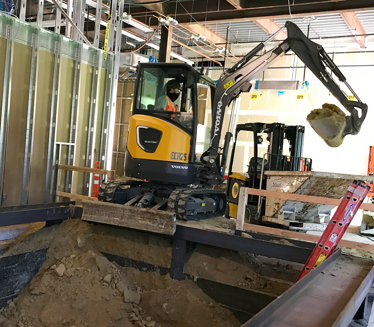 Casper Company using a Volvo ECR25 Electric for Indoor Demolition