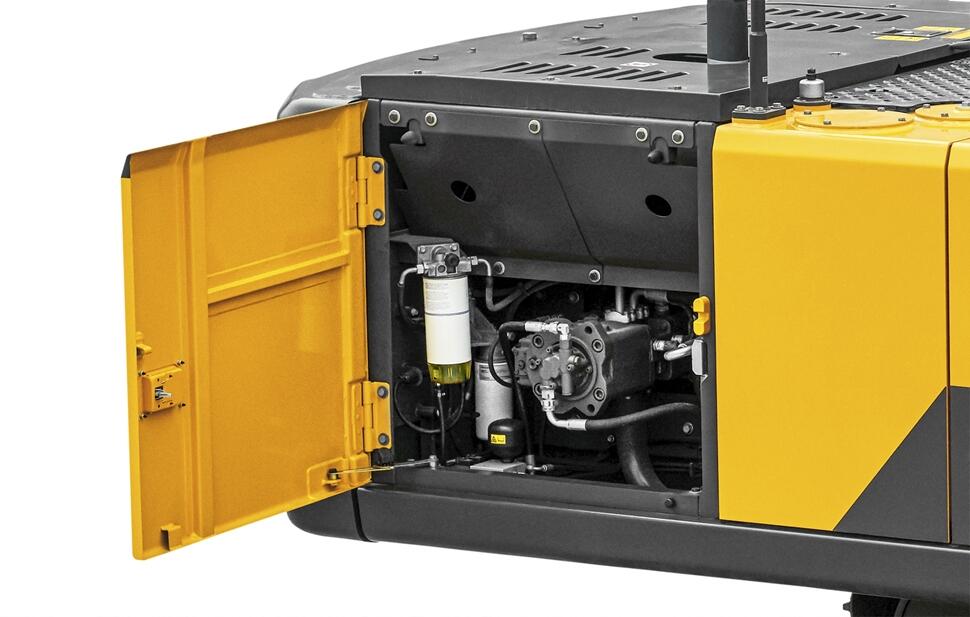 Service compartment opened on a Volvo excavator.