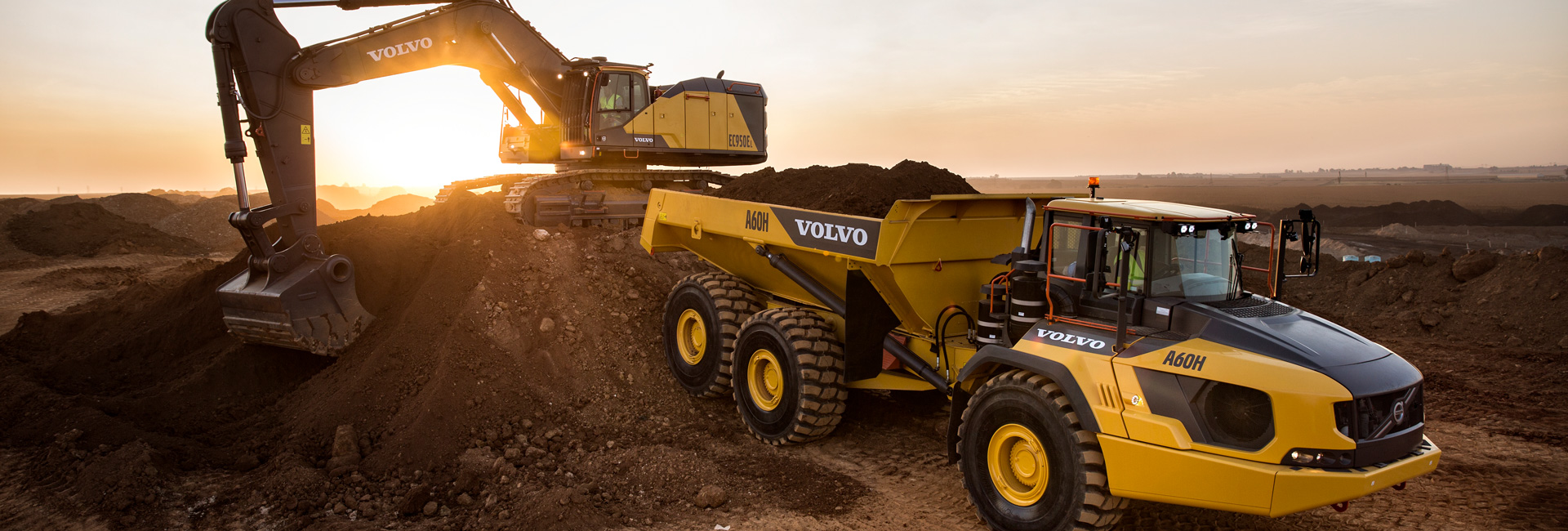 Volvo EC95OF excavator and A60H articulated hauler on active construction site