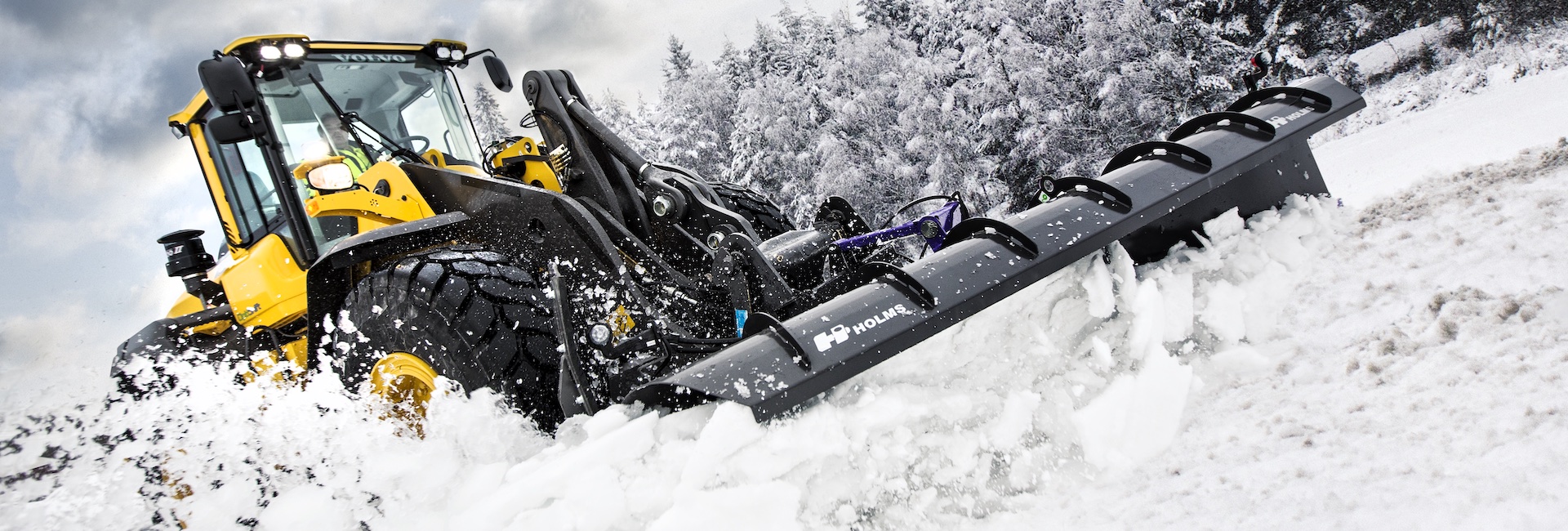 Volvo L70H Wheel Loader Clearing Snow