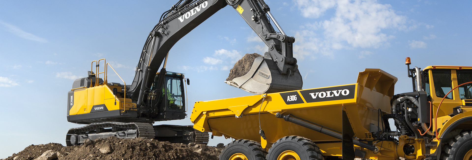 Volvo Excavator loading a Volvo Articulated Truck
