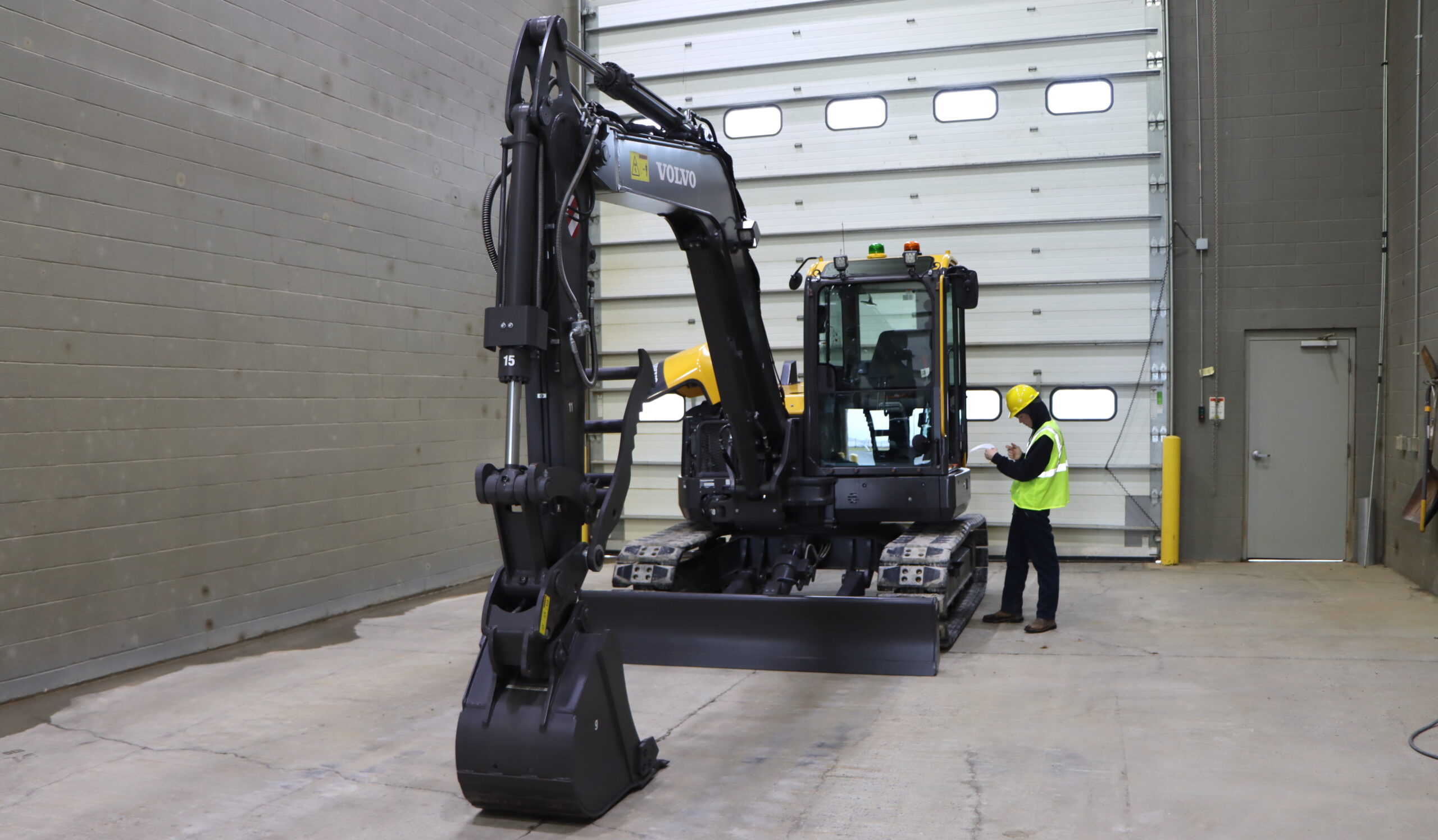 Young SkillsUSA Operator with Volvo Excavator