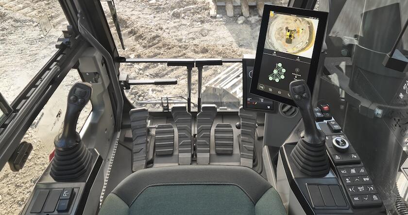 View of the cab controls from an operator’s perspective in a new Volvo excavator.