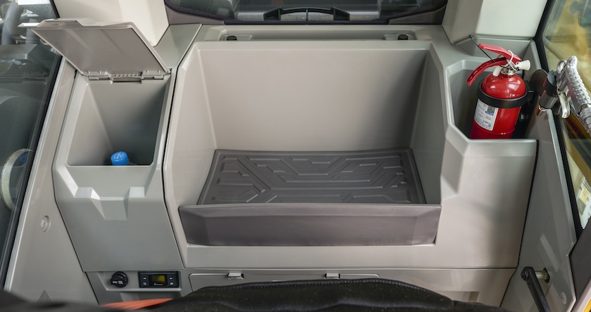 View of the new food and drink storage compartment in new Volvo excavators.