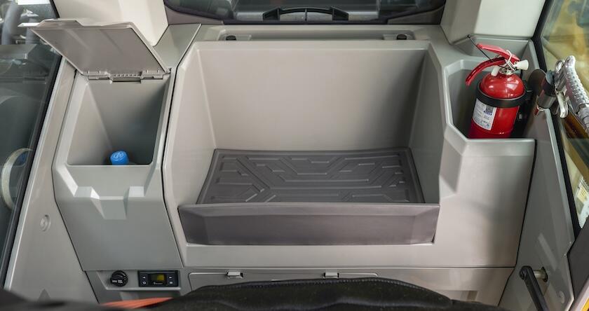 View of the new food and drink storage compartment in new Volvo excavators.