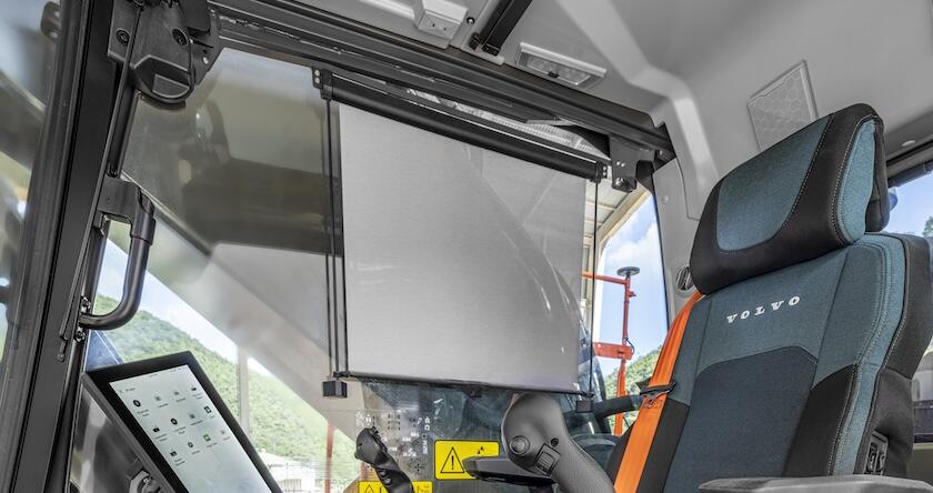 Cab view of a new sunscreen pulled down in new Volvo excavators.
