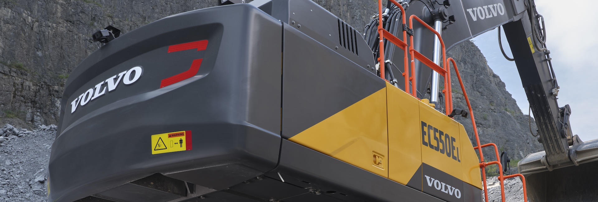Close up of a Volvo EC550E excavator working in a quarry.