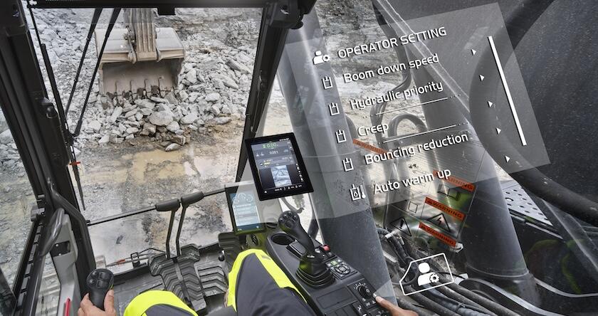 Image from an operator’s view of an excavator loading rock. A graphic shows the different Operator Settings that can be selected using Volvo Independent Metering Valve Technology.