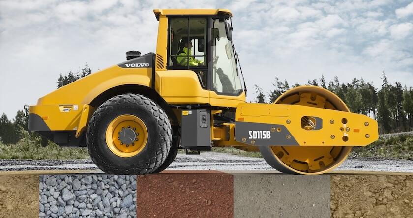 Compacteur de sol Volvo SD115B avec différents types de granulats et de sols représentés en dessous.