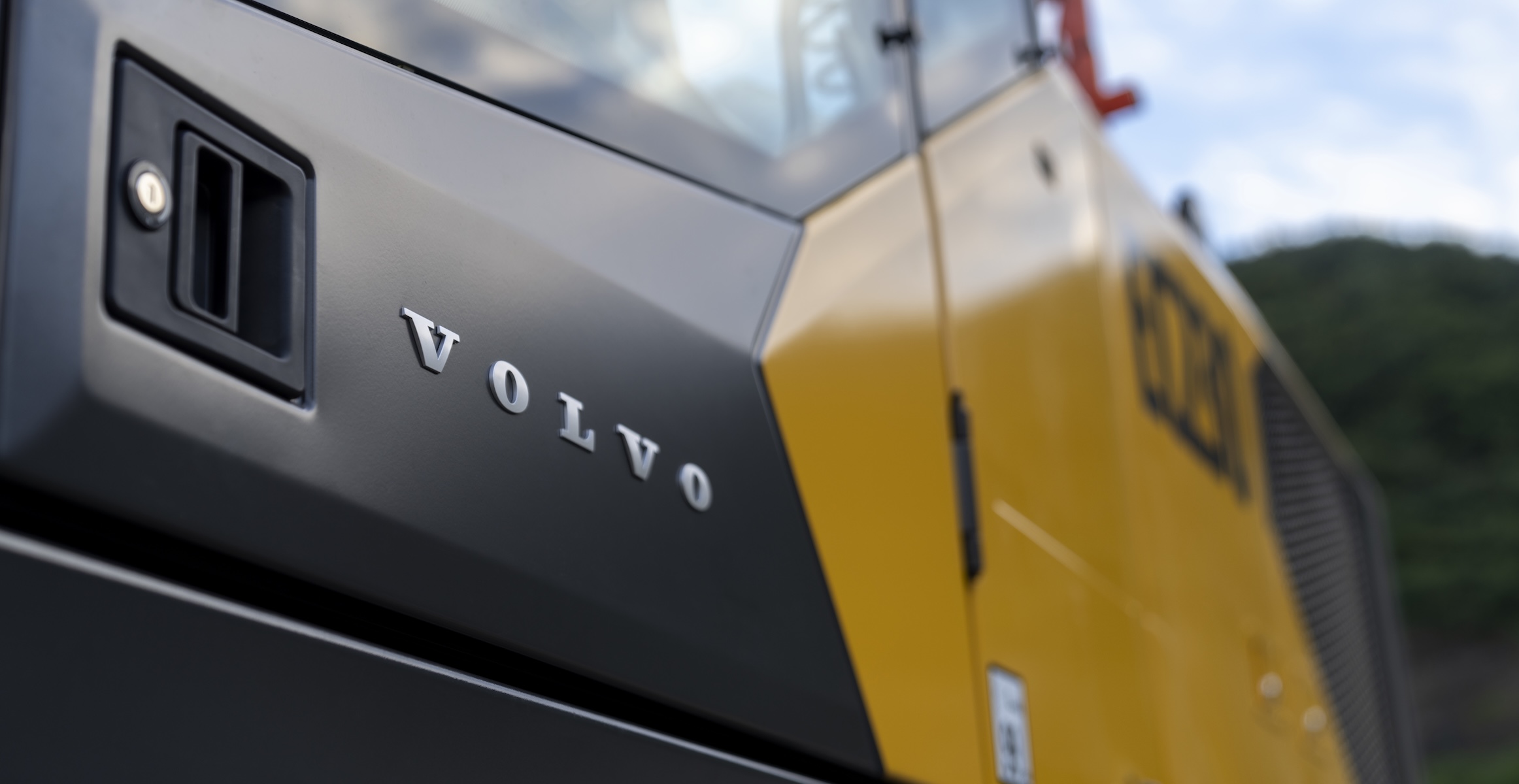 A close-up of the Volvo emblem on a new Volvo excavator.