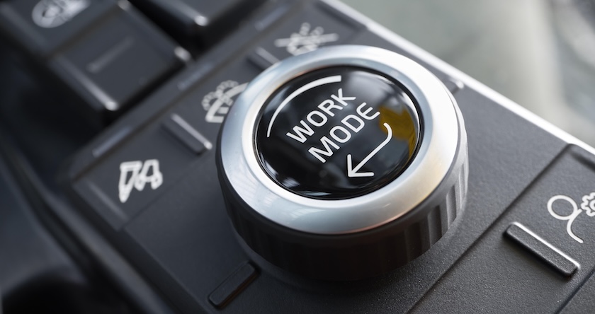 The dial to adjust the work mode on a Volvo excavator.