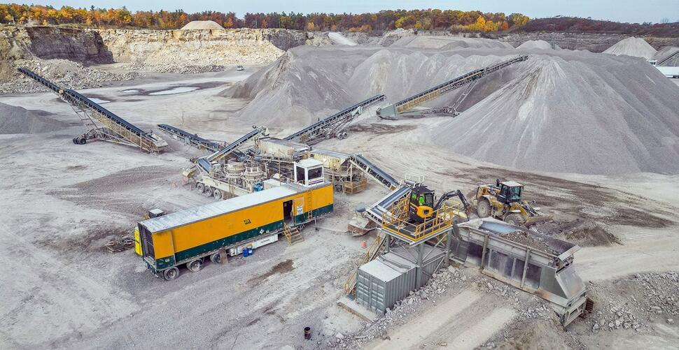 A Volvo electric excavator at a Cox Construction quarry site near Toronto, CA.