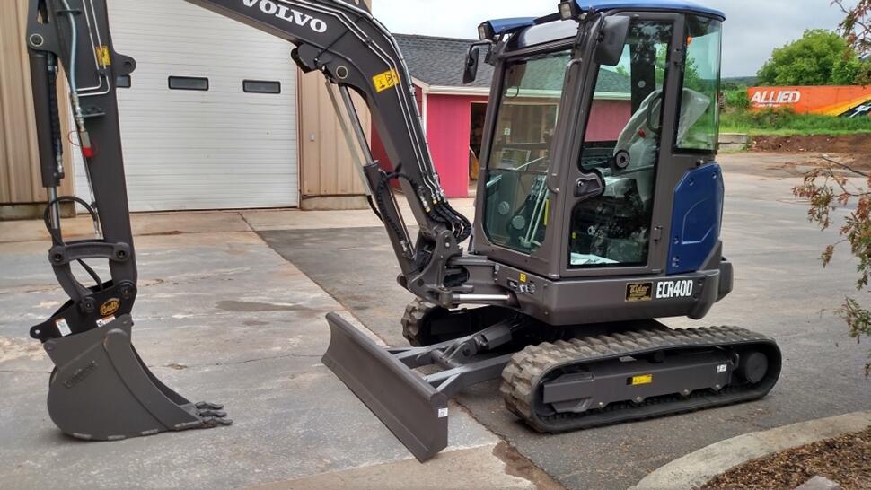 Volvo ECR40D mini excavator painted in Volvo Ocean Race blue for Barber Utilities