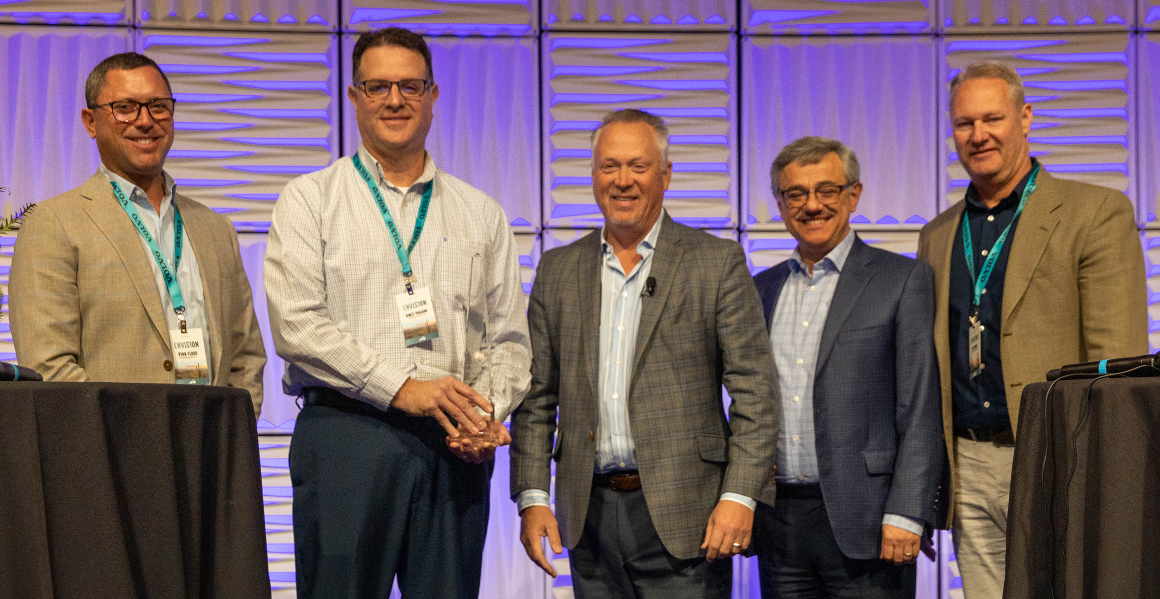 Highway Equipment & Supply Co. accepts the 2021 Volvo CE Dealer of the Year Award 