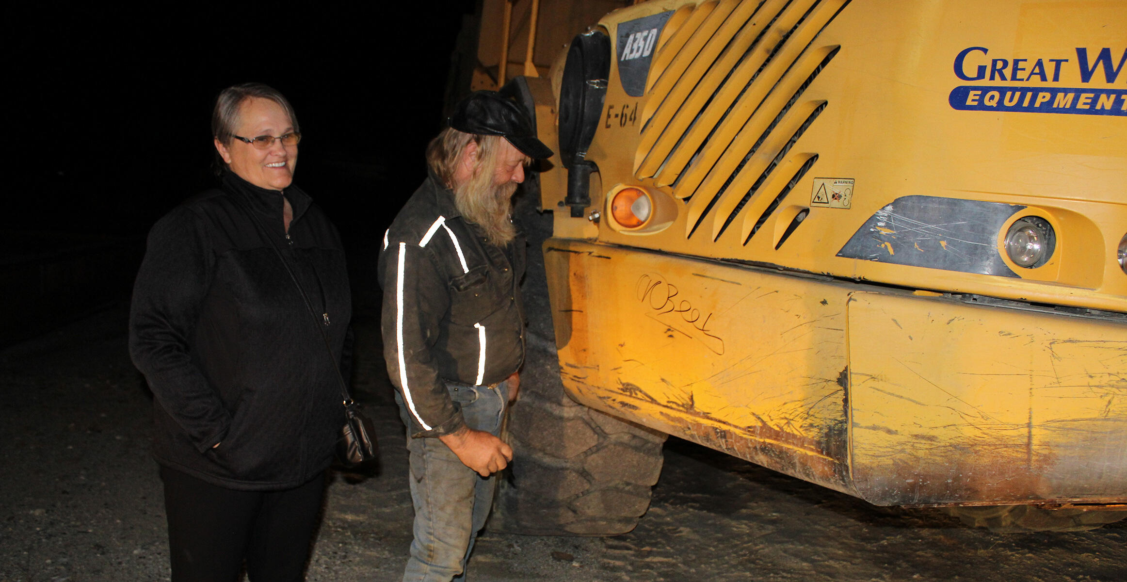 Tony Beets from Gold Rush signs a donated Volvo Articulated Truck