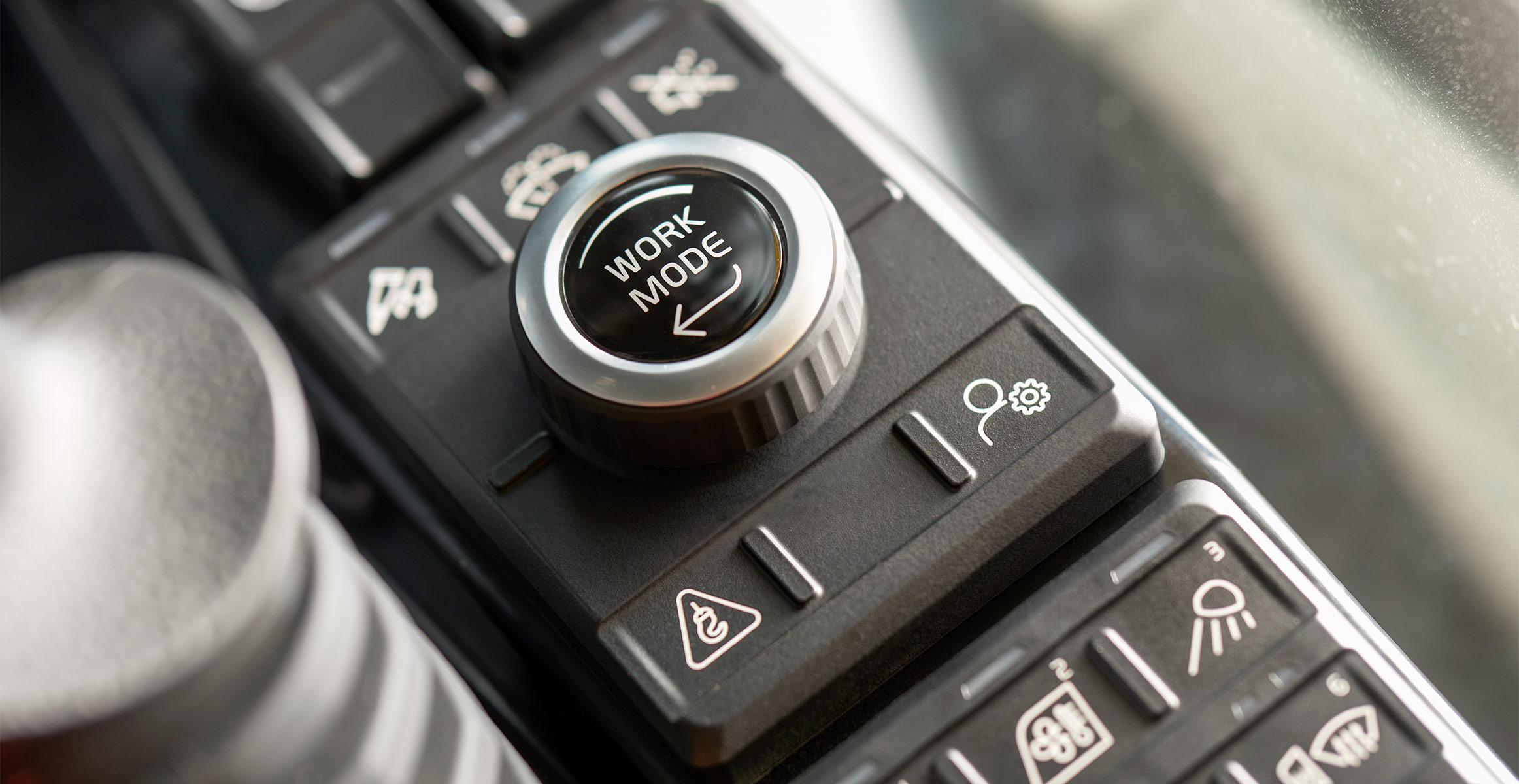 A close-up of the work modes dial on new Volvo excavators.