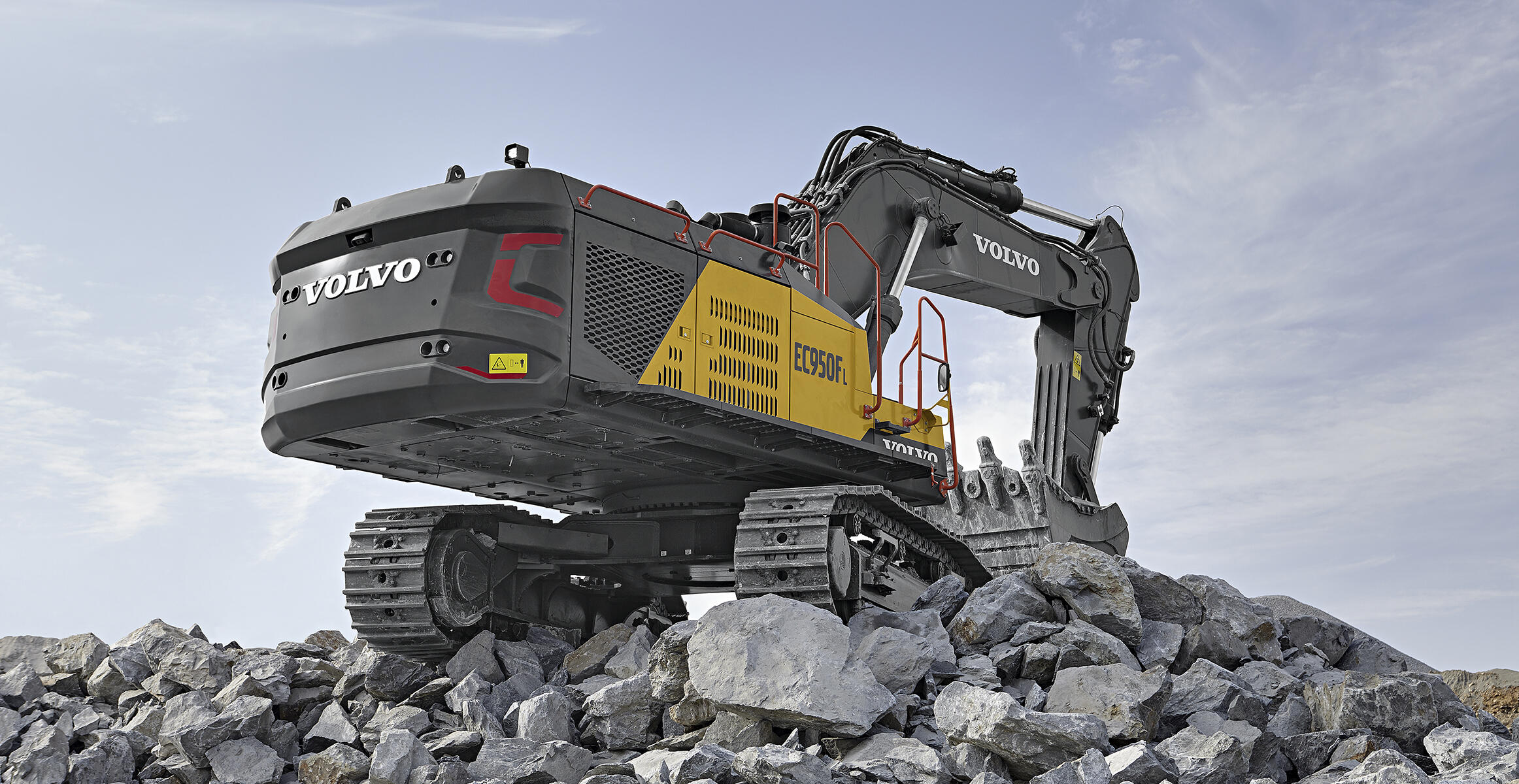 A Volvo EC950 excavator loading rock in a quarry. 